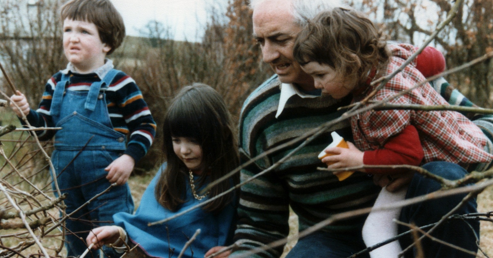 John with his three children in Cumbria