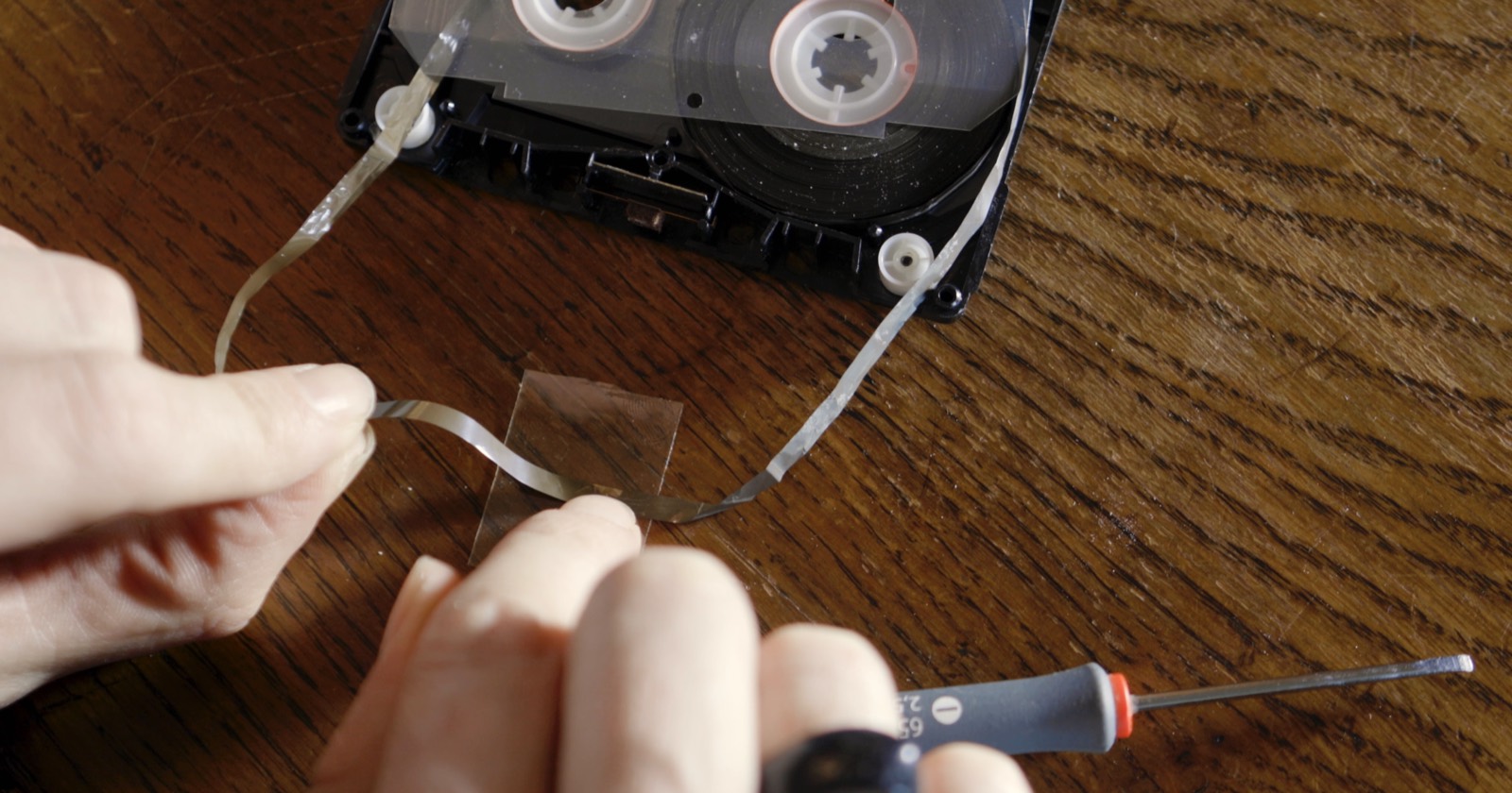 Repairing a damaged cassette tape recorded by Sue